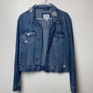 Distressed denim jacket